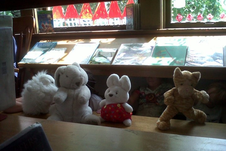 Kids putting on an impromptu puppet show at the library.